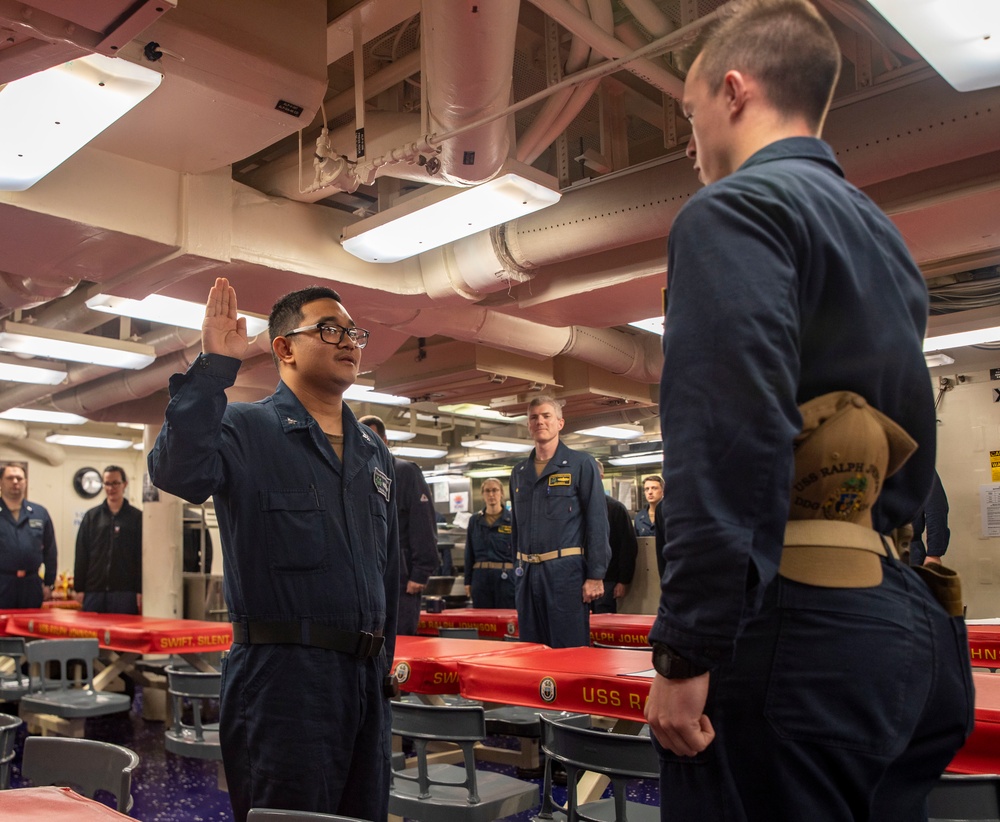 A Sailor Re-Enlists Aboard USS Ralph Johnson (DDG 114)