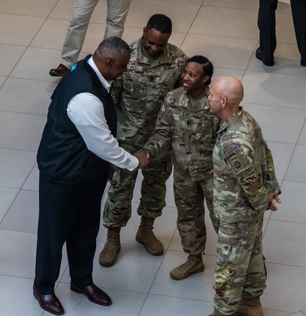 Secretary of Defense Lloyd J. Austin III speaks with Command Sergeant Major Tonya Sims