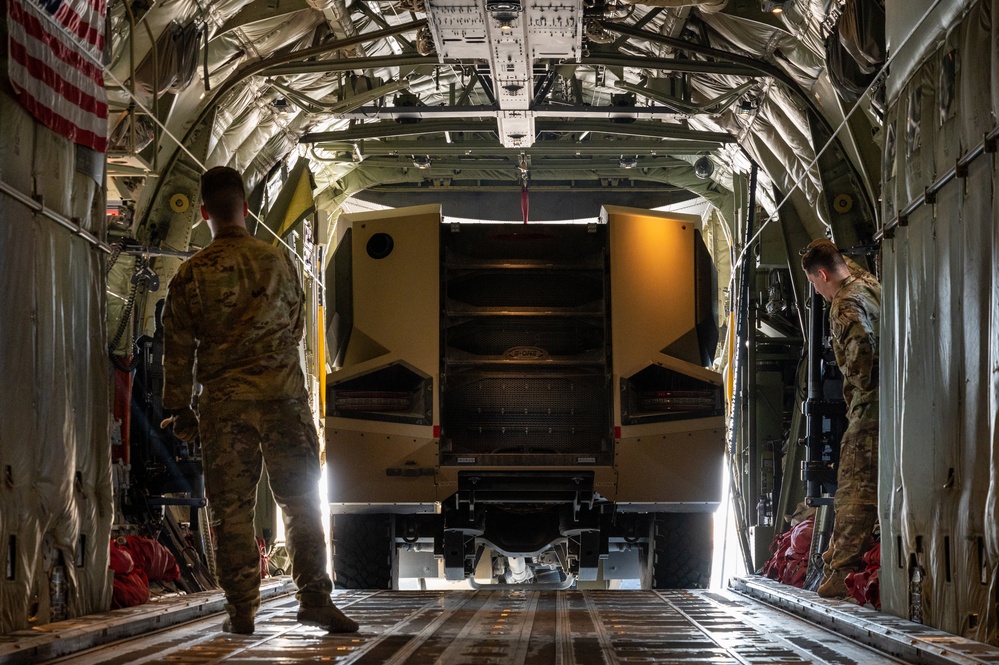 A perfect fit: a P-19C is loaded inside a Hercules