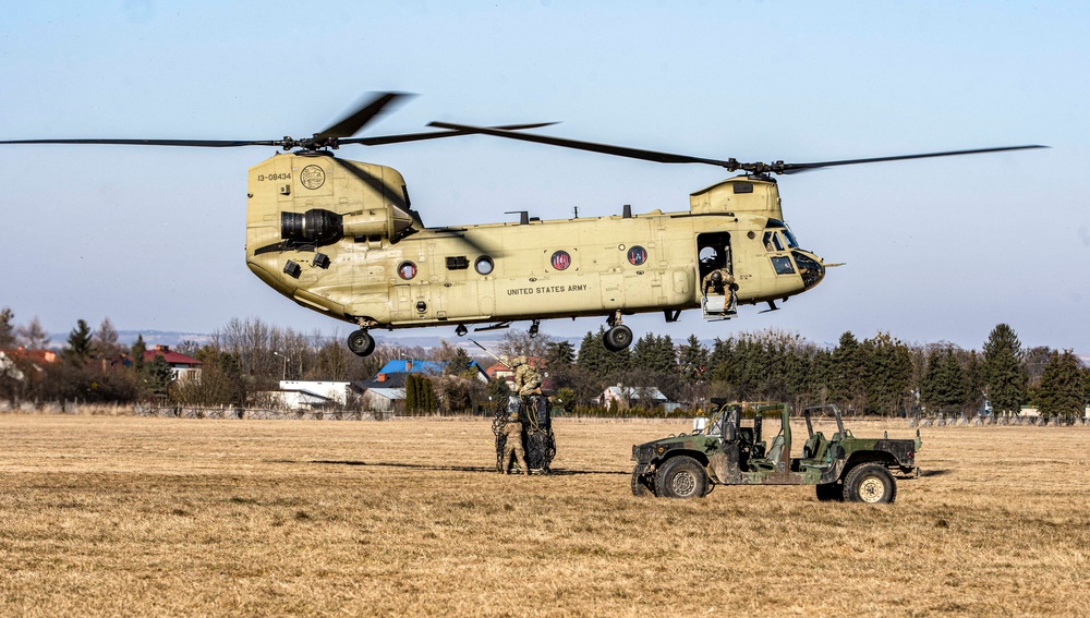 U.S. Paratroopers conduct sling load training in Poland