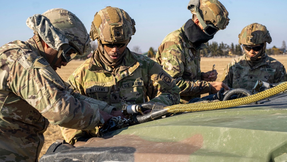 U.S. Paratroopers conduct sling load training in Poland