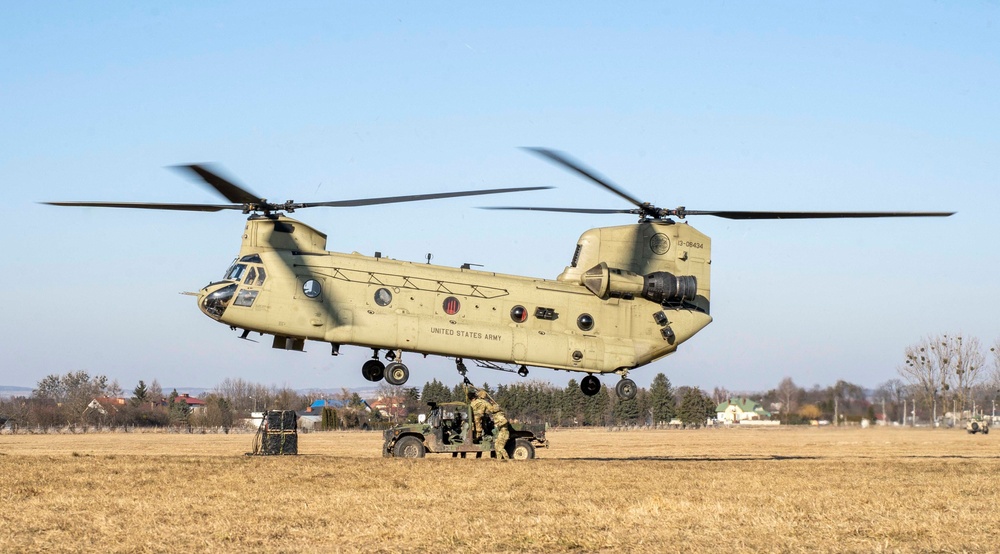 U.S. Paratroopers conduct sling load training in Poland