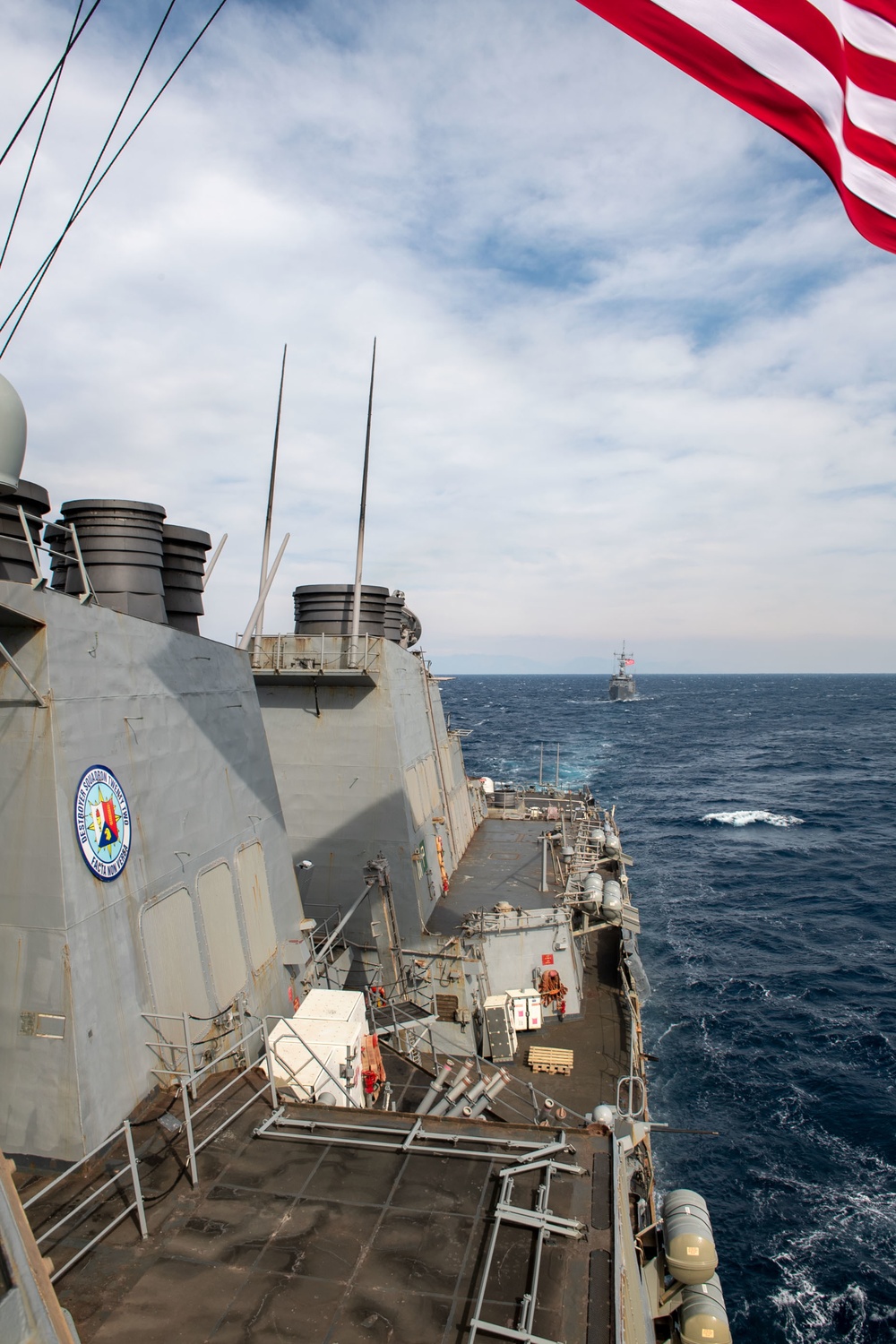 Arleigh Burke-class guided-missile destroyer USS Mitscher (DDG 57) conducts a passing exercise with Turkish Navy Oliver Hazard Perry-class frigate TCG Giresun (F 491)