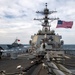 Arleigh Burke-class guided-missile destroyer USS Mitscher (DDG 57) conducts a passing exercise with Turkish Navy Oliver Hazard Perry-class frigate TCG Giresun (F 491)