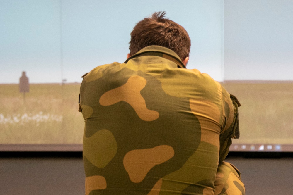 Norwegian Soldiers prepare for weapons qualification at Camp Ripley