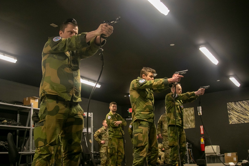 Norwegian Soldiers prepare for weapons qualification at Camp Ripley