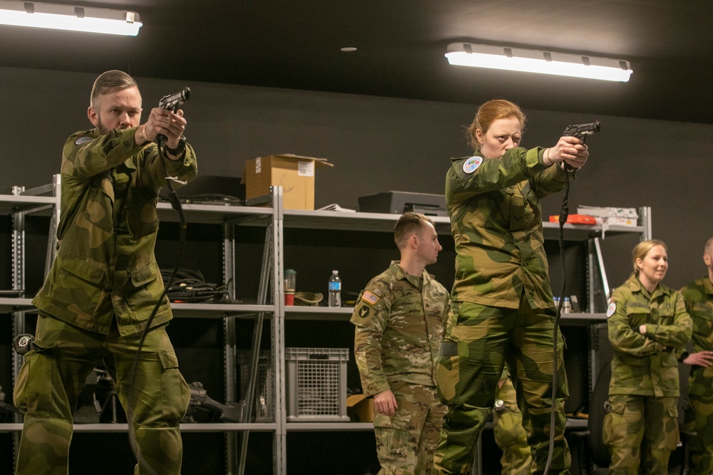 Norwegian Soldiers prepare for weapons qualification at Camp Ripley