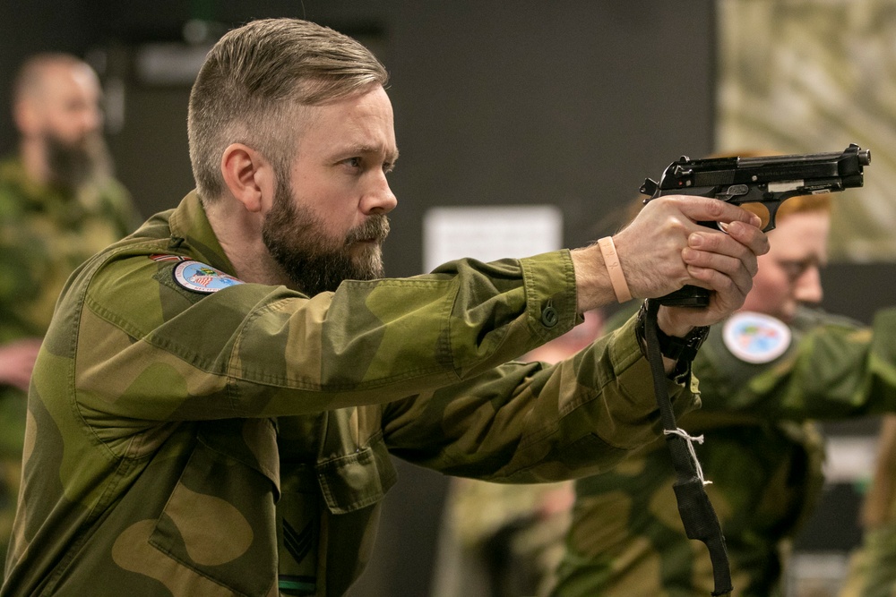 Norwegian Soldiers prepare for weapons qualification at Camp Ripley