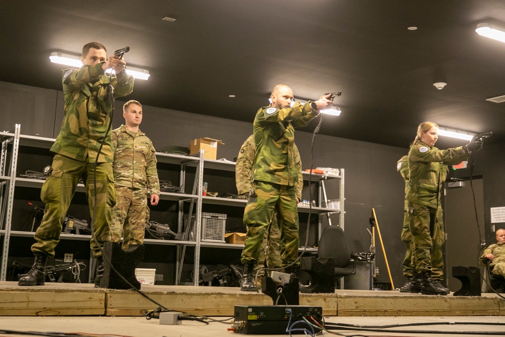 Norwegian Soldiers prepare for weapons qualification at Camp Ripley