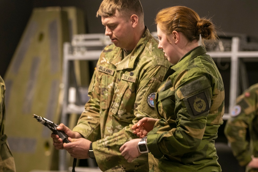 Norwegian Soldiers prepare for weapons qualification at Camp Ripley