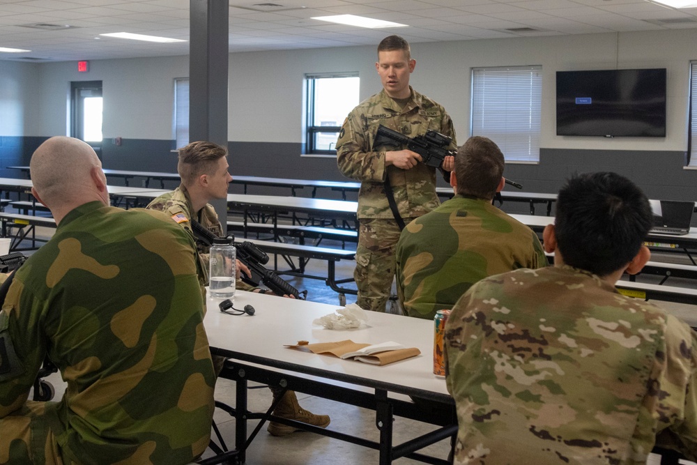 Norwegian Soldiers prepare for weapons qualification at Camp Ripley