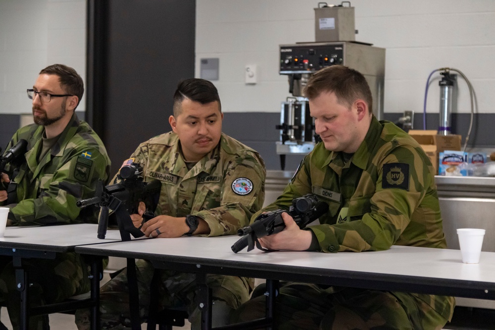 Norwegian Soldiers prepare for weapons qualification at Camp Ripley