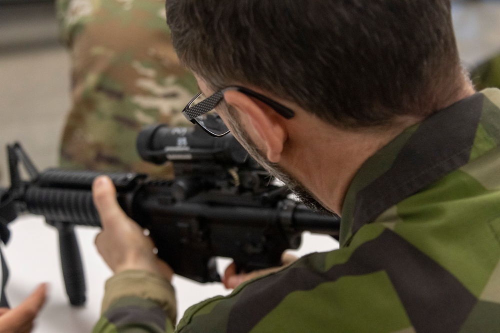 Norwegian Soldiers prepare for weapons qualification at Camp Ripley