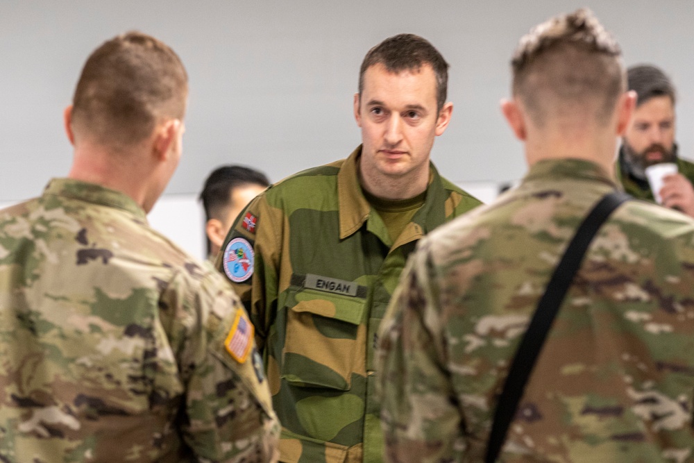 Norwegian Soldiers prepare for weapons qualification at Camp Ripley