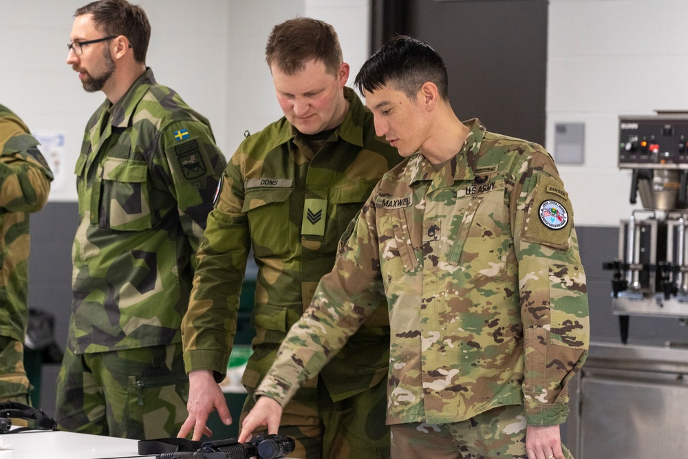 Norwegian Soldiers prepare for weapons qualification at Camp Ripley