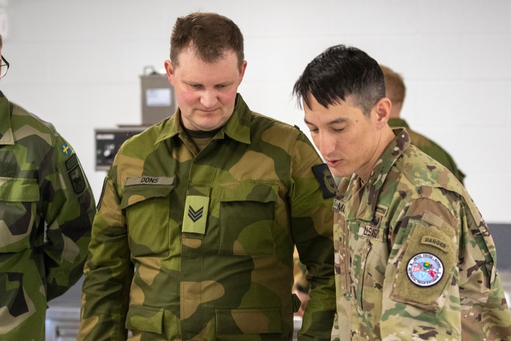 Norwegian Soldiers prepare for weapons qualification at Camp Ripley