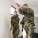 Norwegian Soldiers prepare for weapons qualification at Camp Ripley