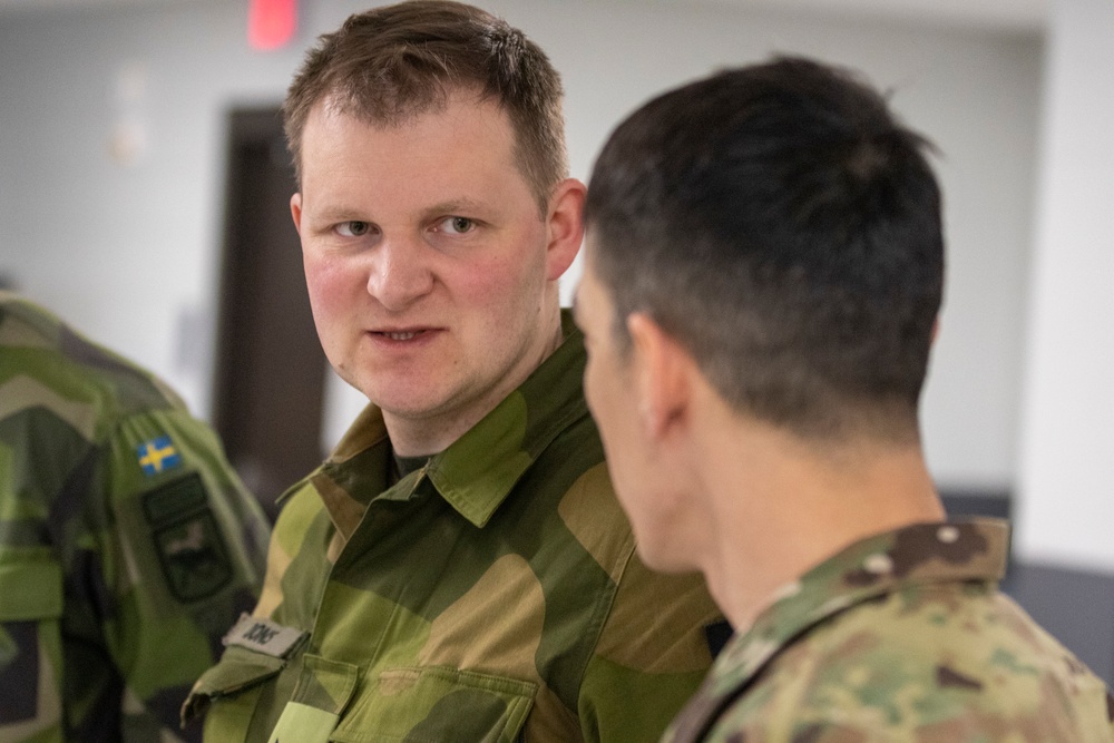 Norwegian Soldiers prepare for weapons qualification at Camp Ripley