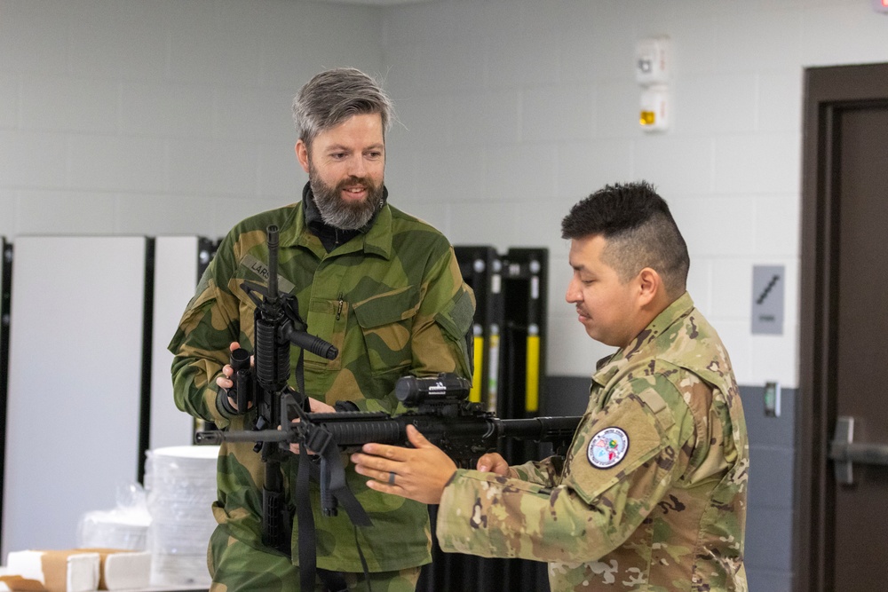 Norwegian Soldiers prepare for weapons qualification at Camp Ripley