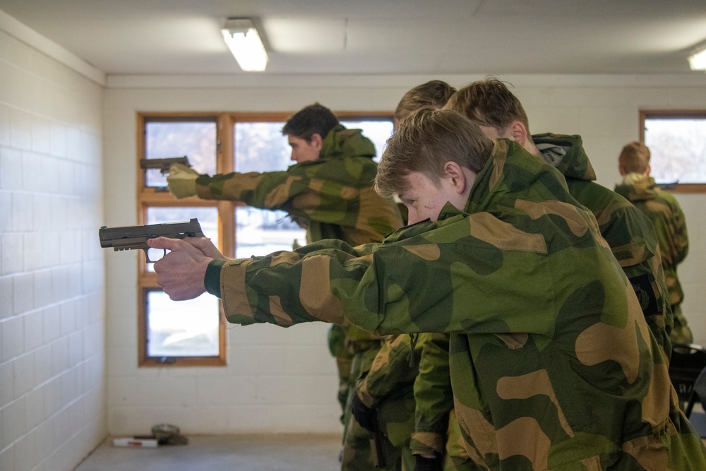 Norwegian Soldiers prepare for weapons qualification at Camp Ripley