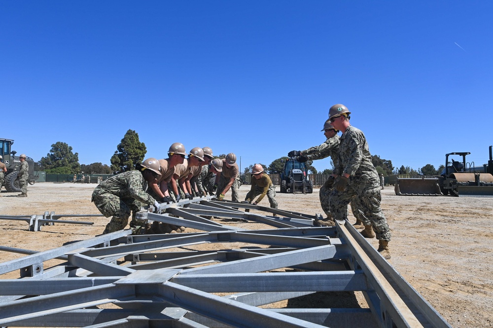 US Navy Seabees with Naval Mobile Construction Battalion 5 build a Mabey Johnson Bridge