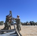 US Navy Seabees with Naval Mobile Construction Battalion 5 build a Mabey Johnson Bridge