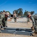 US Navy Seabees with Naval Mobile Construction Battalion 5 build a Mabey Johnson Bridge