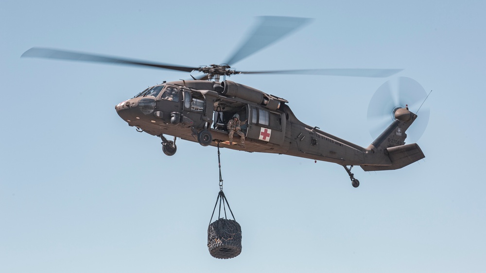 U.S. Marines and Soldiers with 1st Landing Support Battalion and 7-158th Ground Support Aviation Battalion conduct HST training