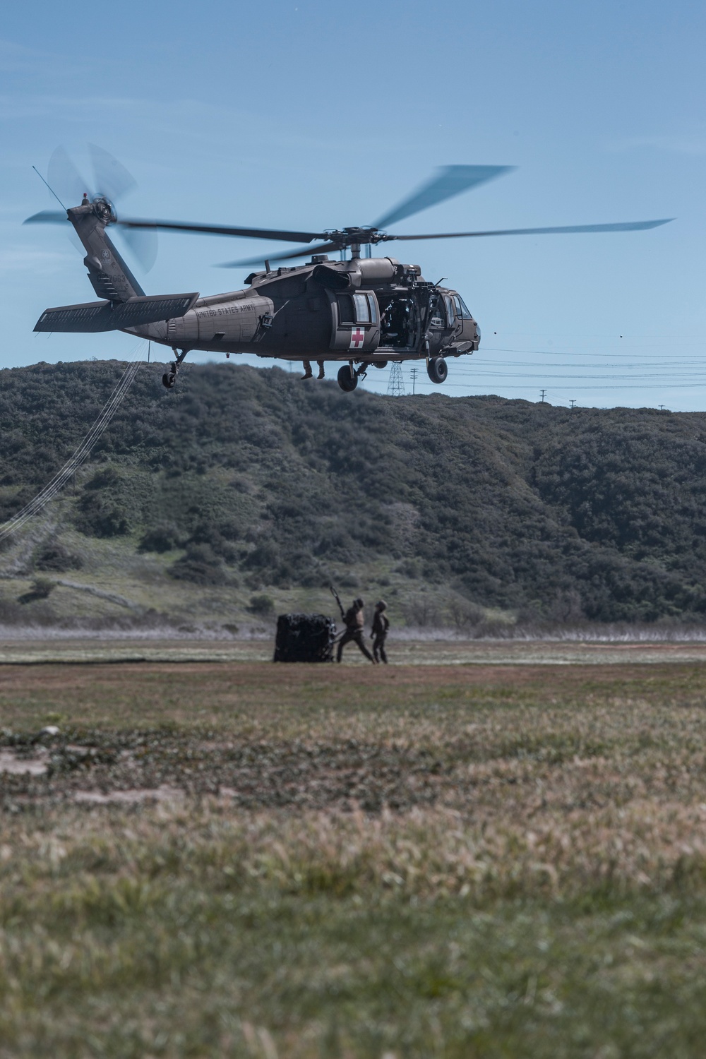 U.S. Marines and Soldiers with 1st Landing Support Battalion and 7-158th Ground Support Aviation Battalion conduct HST training