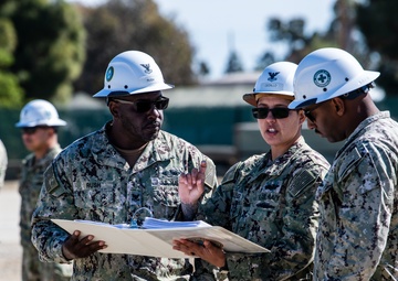 US Navy Seabees with Naval Mobile Construction Battalion 5 build a Mabey Johnson Bridge