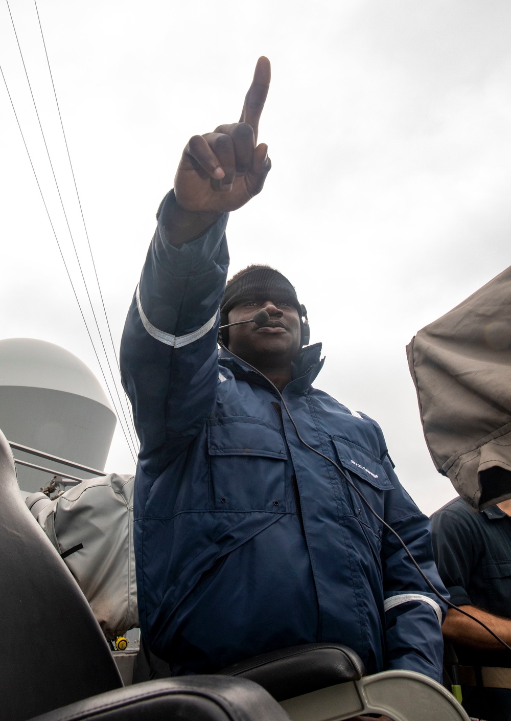 Sailors Aboard USS Ralph Johnson (DDG 114) Conduct Man Overboard Drill