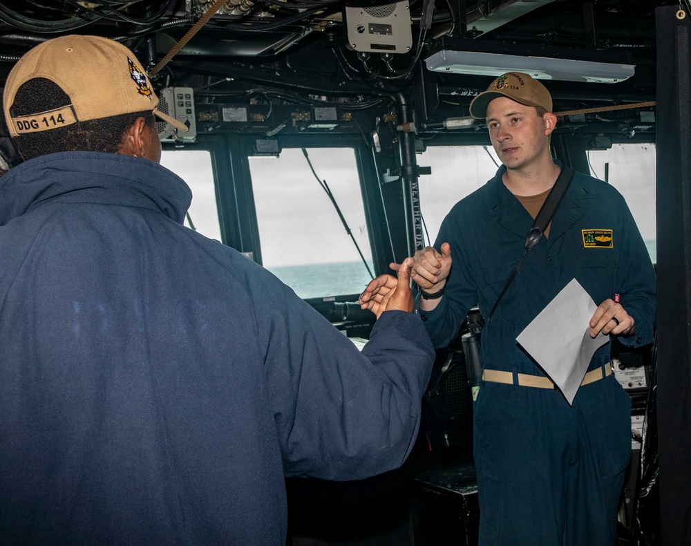 Sailors Aboard USS Ralph Johnson (DDG 114) Conduct Man Overboard Drill