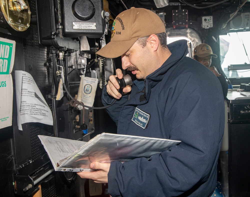 Sailors Aboard USS Ralph Johnson (DDG 114) Conduct Man Overboard Drill