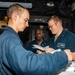 Sailors Aboard USS Ralph Johnson (DDG 114) Conduct Man Overboard Drill