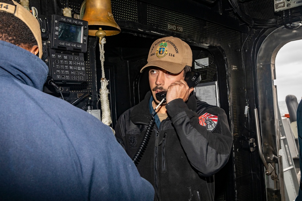 Sailors Aboard USS Ralph Johnson (DDG 114) Conduct Man Overboard Drill