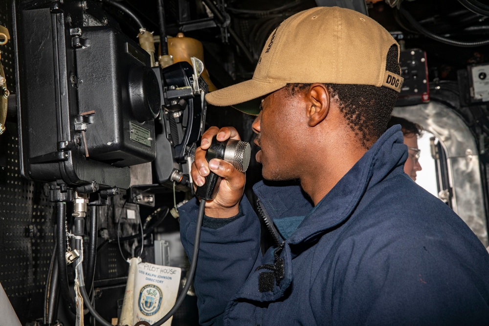 Sailors Aboard USS Ralph Johnson (DDG 114) Conduct Man Overboard Drill