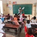 A Teacher and His Students in Yemen Participate in a Remedial Education Class