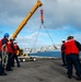 USS Carl Vinson (CVN 70) Sailors Conduct Ordnance Download Operation