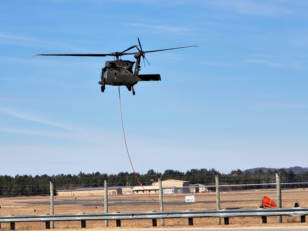 Federal, state agencies partner for fire-suppression training with UH-60 Black Hawks at Fort McCoy