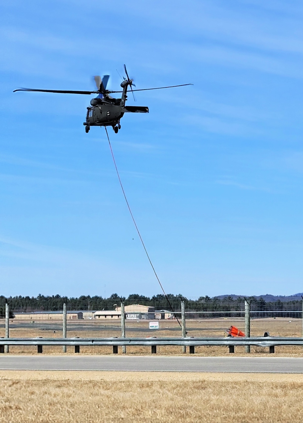 Federal, state agencies partner for fire-suppression training with UH-60 Black Hawks at Fort McCoy