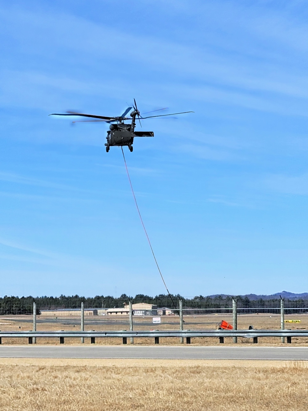 Federal, state agencies partner for fire-suppression training with UH-60 Black Hawks at Fort McCoy