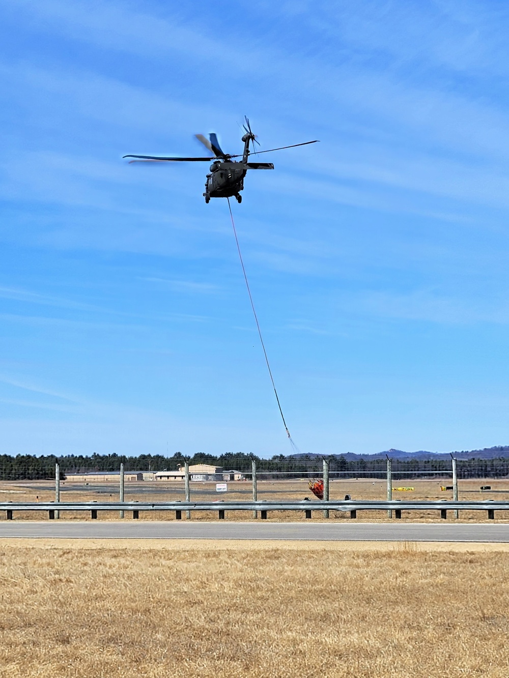 Federal, state agencies partner for fire-suppression training with UH-60 Black Hawks at Fort McCoy