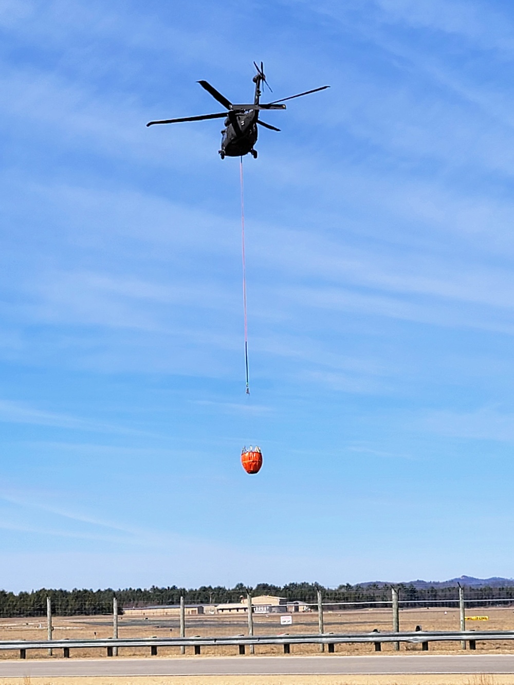 Federal, state agencies partner for fire-suppression training with UH-60 Black Hawks at Fort McCoy