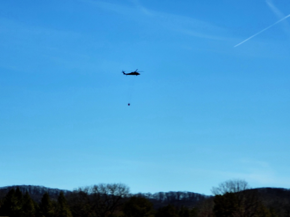 Federal, state agencies partner for fire-suppression training with UH-60 Black Hawks at Fort McCoy