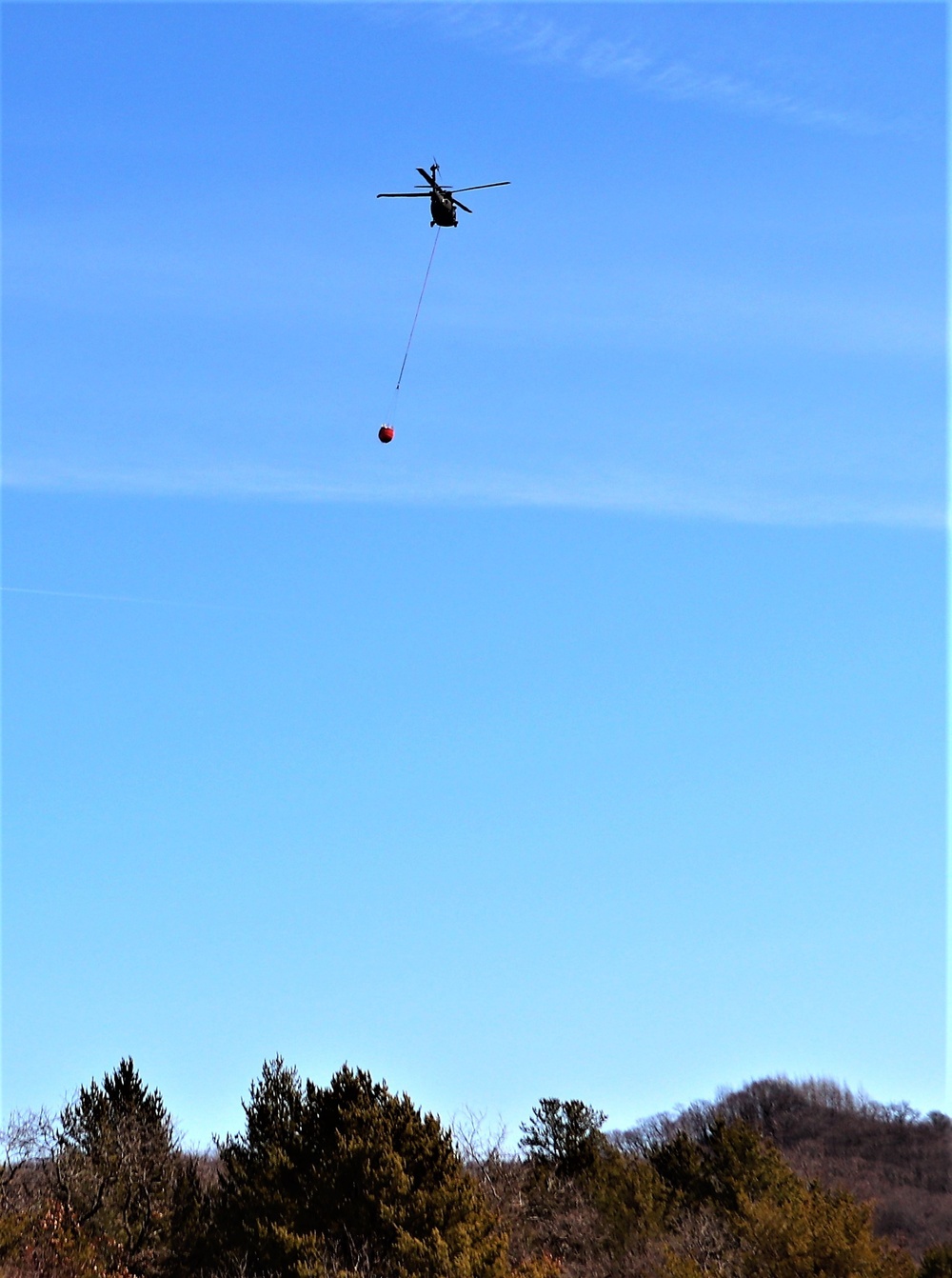 Federal, state agencies partner for fire-suppression training with UH-60 Black Hawks at Fort McCoy