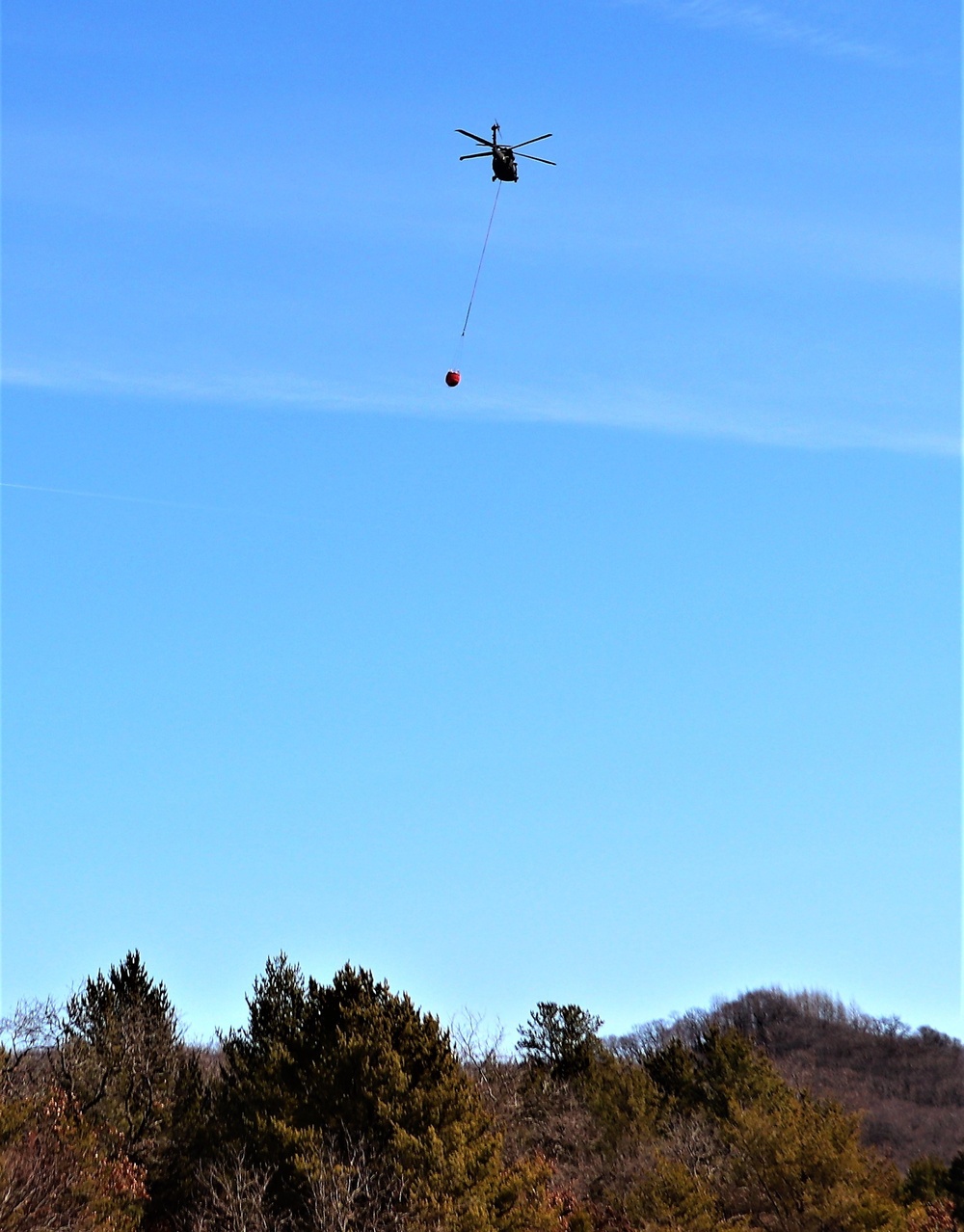 Federal, state agencies partner for fire-suppression training with UH-60 Black Hawks at Fort McCoy