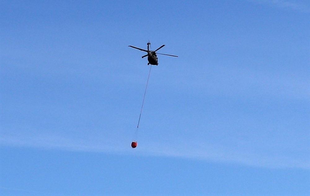 Federal, state agencies partner for fire-suppression training with UH-60 Black Hawks at Fort McCoy