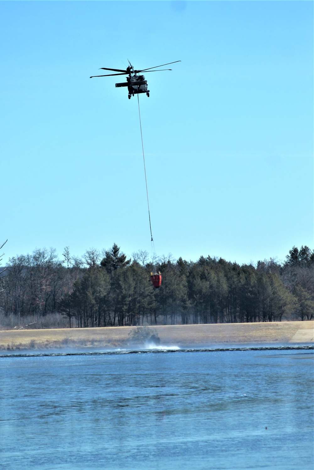 Federal, state agencies partner for fire-suppression training with UH-60 Black Hawks at Fort McCoy