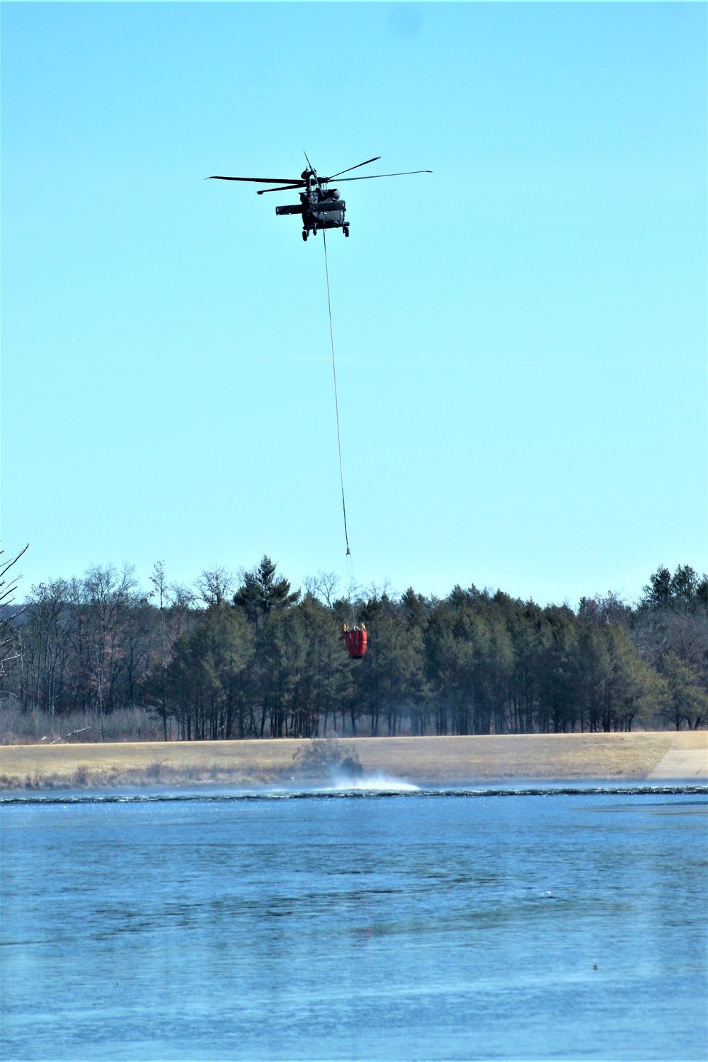 Federal, state agencies partner for fire-suppression training with UH-60 Black Hawks at Fort McCoy