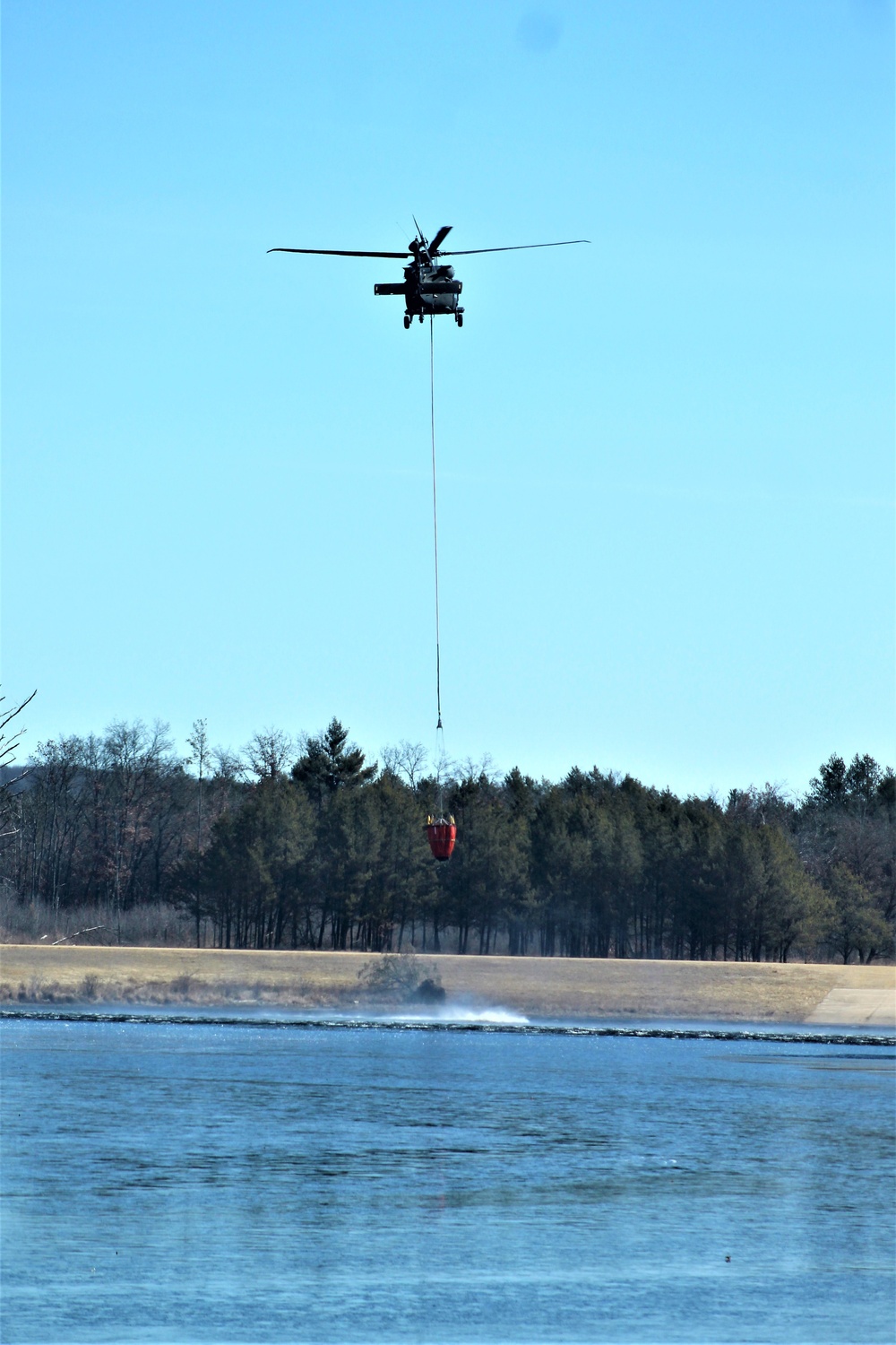 Federal, state agencies partner for fire-suppression training with UH-60 Black Hawks at Fort McCoy